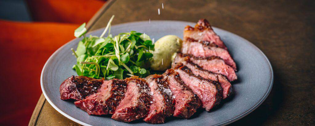 Plate of roast beef with watercress